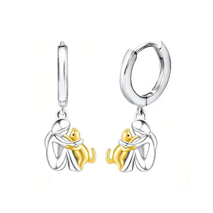 Boucles d'oreilles étreintes de chat bicolores argent et or